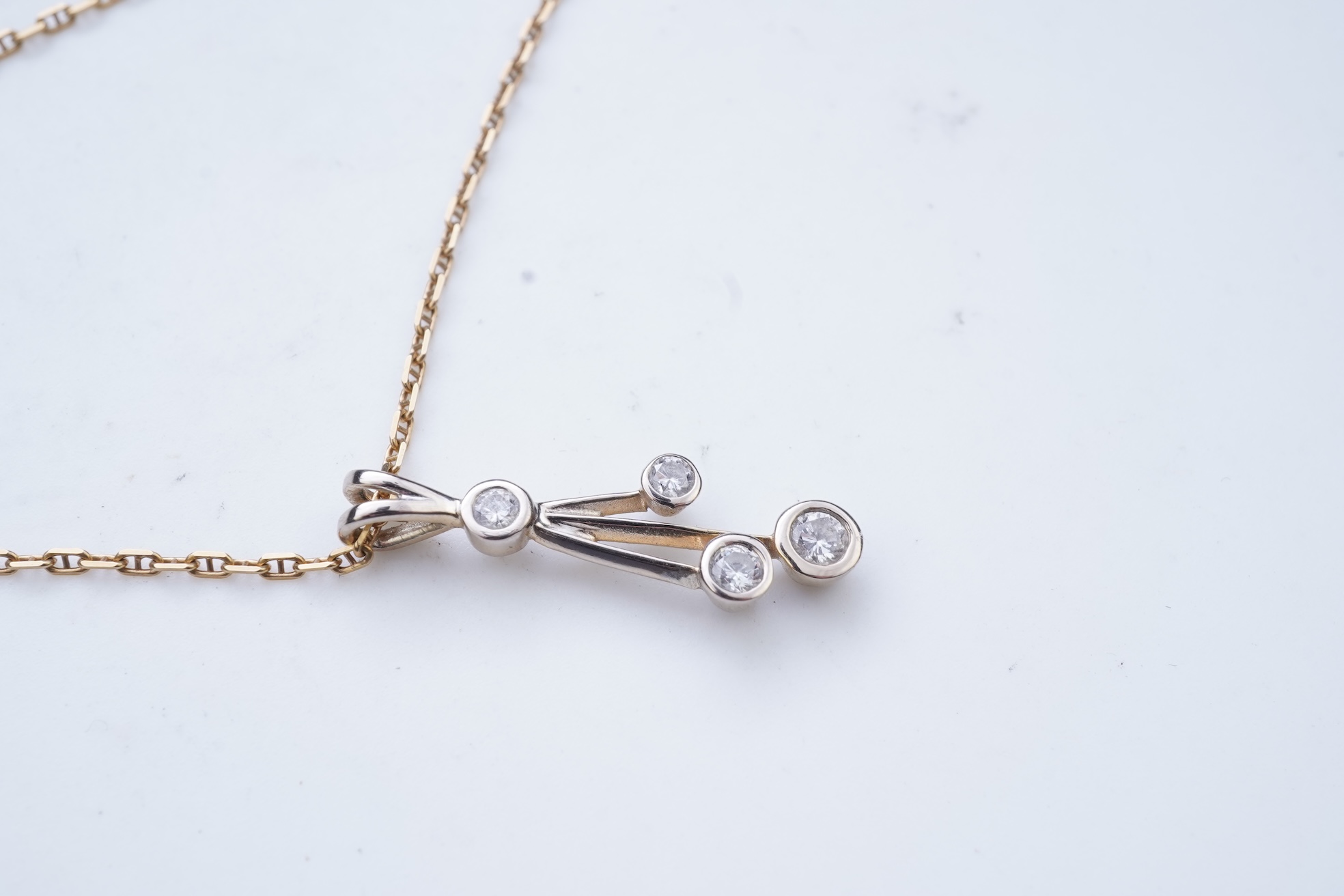 A diamond pendant necklace